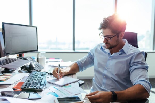 A man working at a desk.