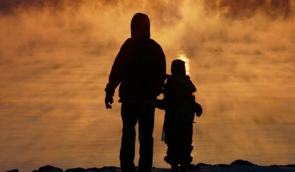 A child with their parent.