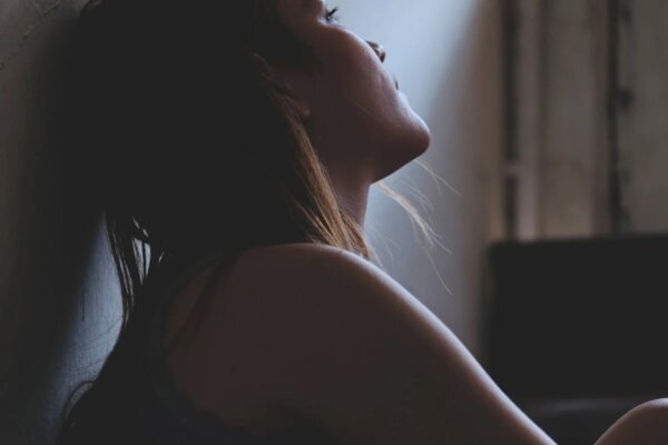 A woman looking stressed.