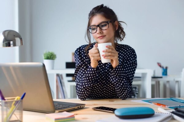A woman at her computer.