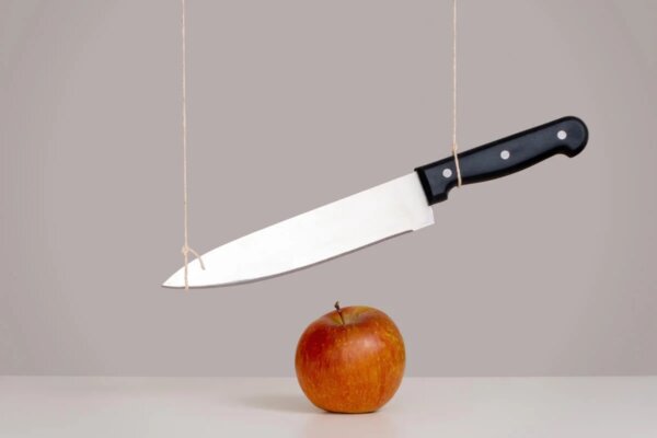 A representation of the sword of Damocles.