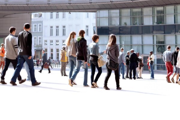 People walking in to their offices.