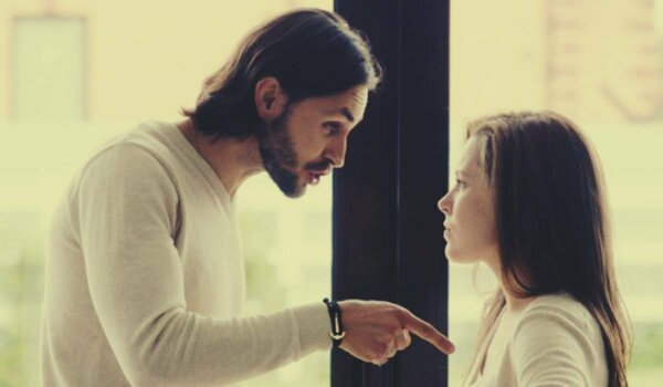 A man accusing a woman.