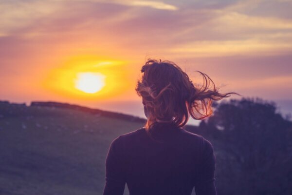 A person watching the sunset.