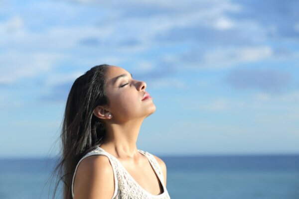 A woman breathing deeply.