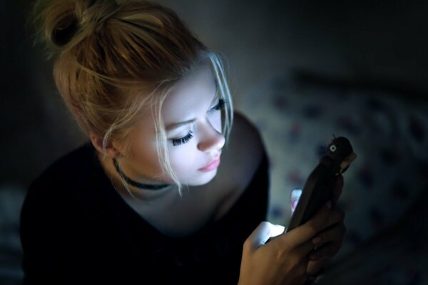 A woman typing.