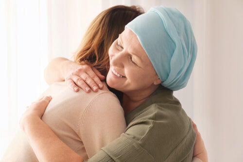 Two women hugging.
