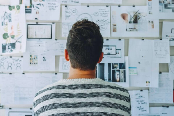 A man thinking, generating a hypothesis, exhibiting lay epistemics.