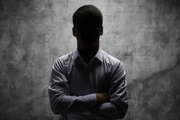 A man in shadow.