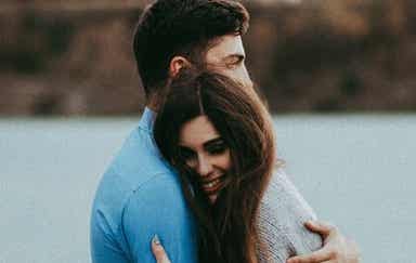 A couple hugging.
