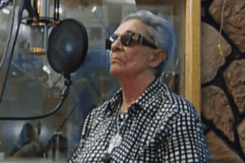 A singer recording.