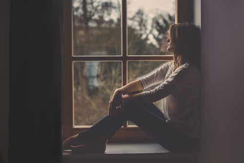A woman by the window.