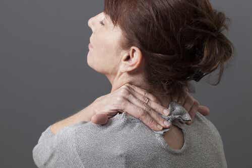 An image of woman with neck pain.