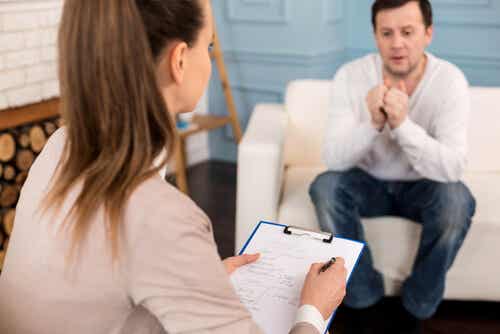 A photo of a woman counseling a man about pornography addiction