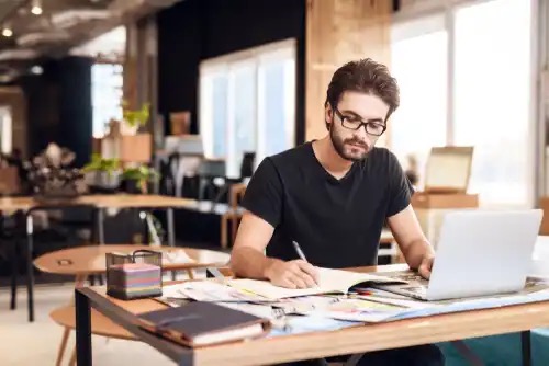 A man working at his desk.