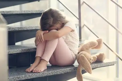 A child looking distressed.