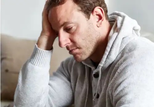 A man suffering from sadness.