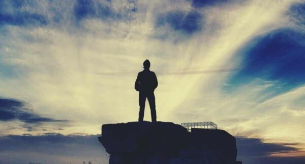A person on top of a tower.
