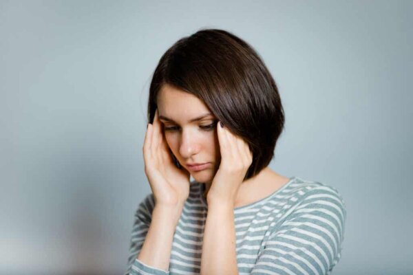 A woman experiencing thought broadcasting.