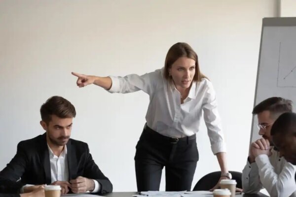 A woman shouting, showing intransigence.