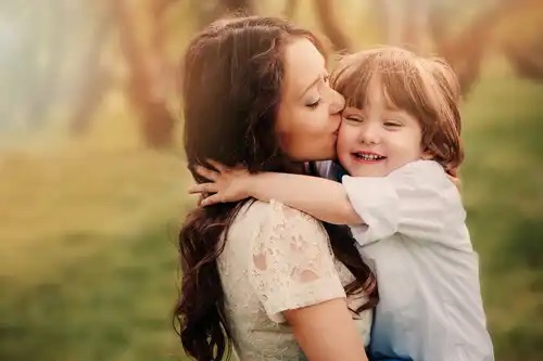 A child and his mother.