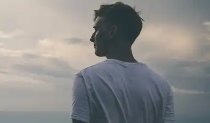 A man looking into the distance.