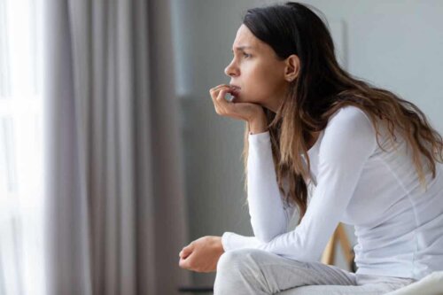 A woman feeling worried.