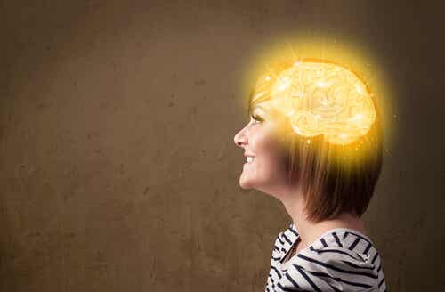 An image of a happy woman with highlighted brain.