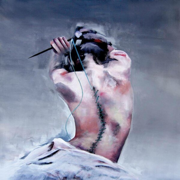 A person suffering, demonstrating you should stop being a prisoner of your own pain.