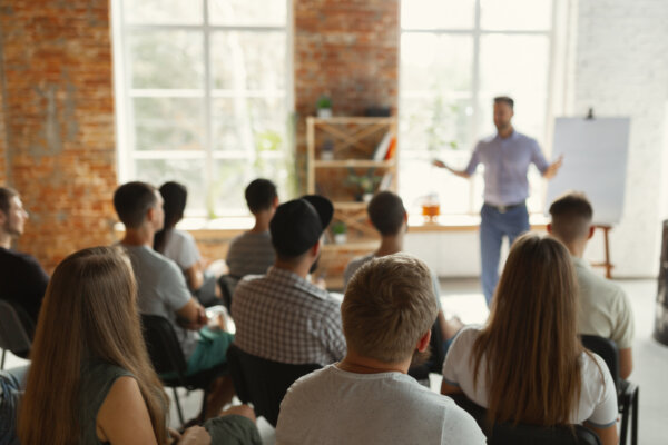 A teacher teaching psychology, representing the importance of continuing education in psychology