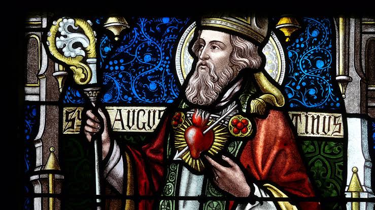 A stained-glass image of Saint Augustine.
